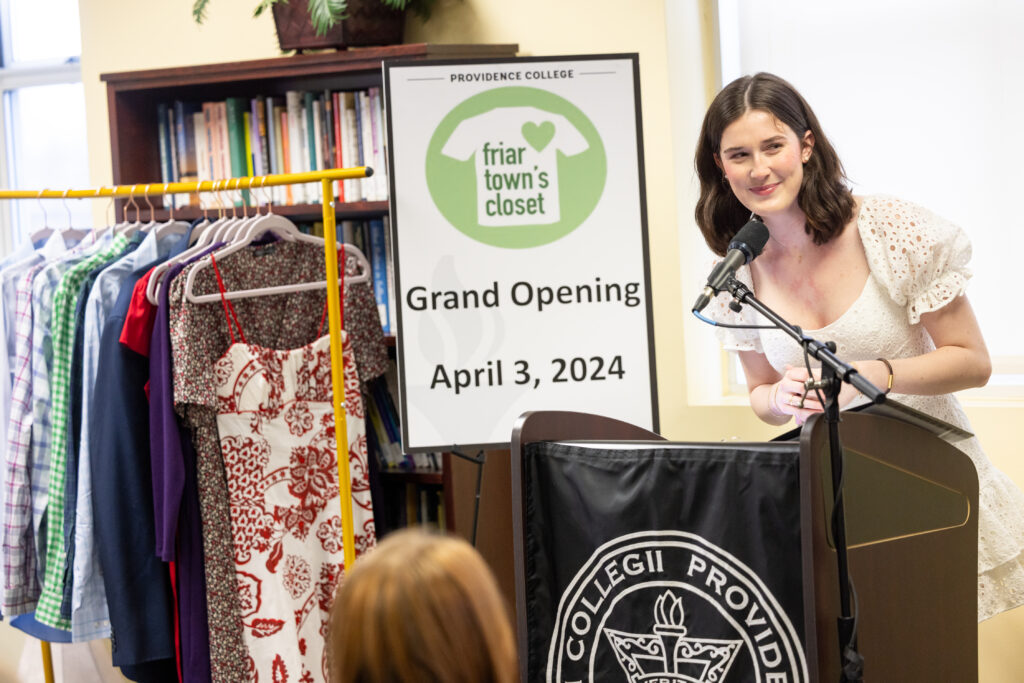 Mary Gifford welcoming crowd at the grand opening of Friartown's Closet